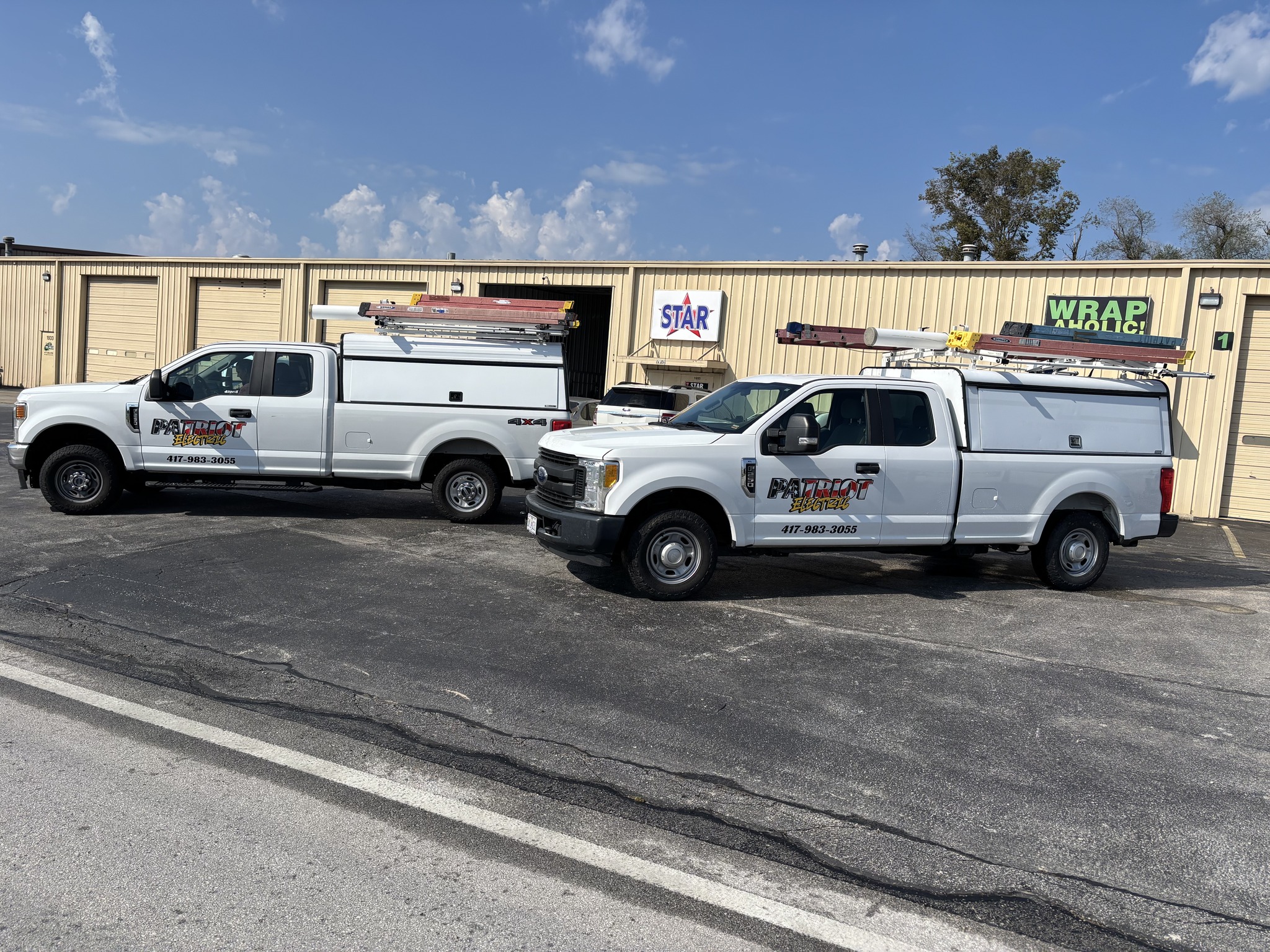 Patriot-Electric-Vehicles Patriot Electic vehicles at a commercial electrician site